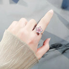 Bague ajustable avec fleur rotative anti-stress en cristaux roses