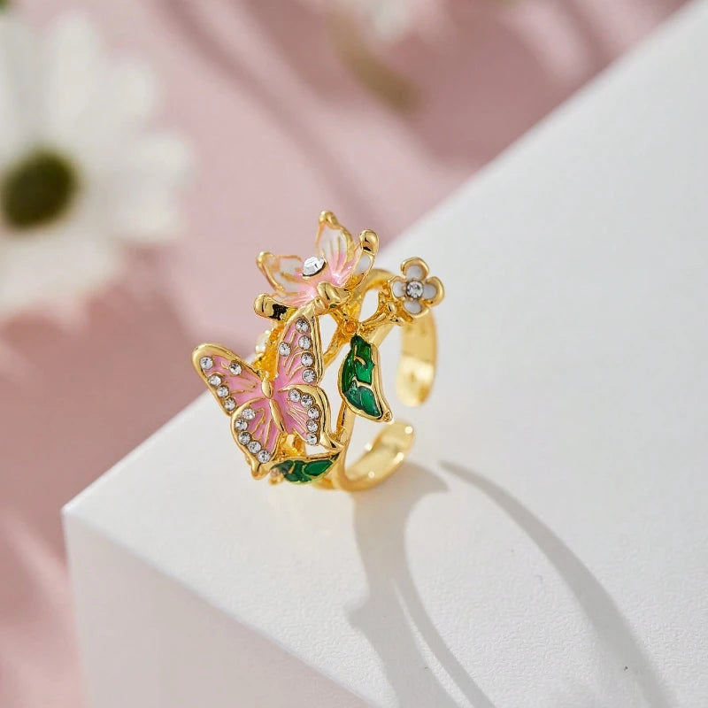 Verstellbarer Ring Kirschblüte und Schmetterling Gold
