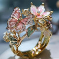 Verstellbarer Ring Kirschblüte und Schmetterling Gold