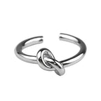 Verstellbarer Ring mit silberfarbenem Knoten