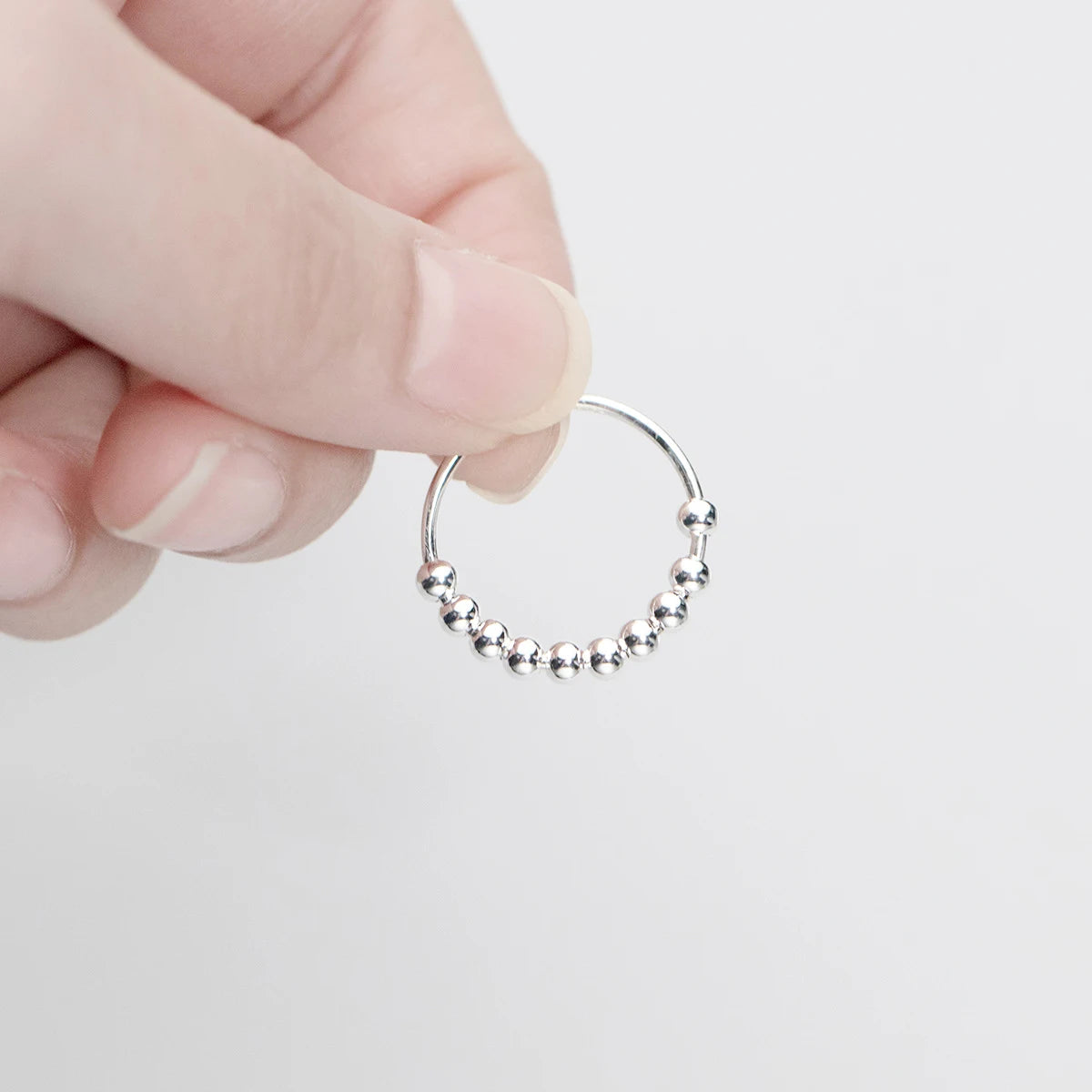 Anti-Stress-Ring mit drehbaren Perlen für Herren oder Damen Silber