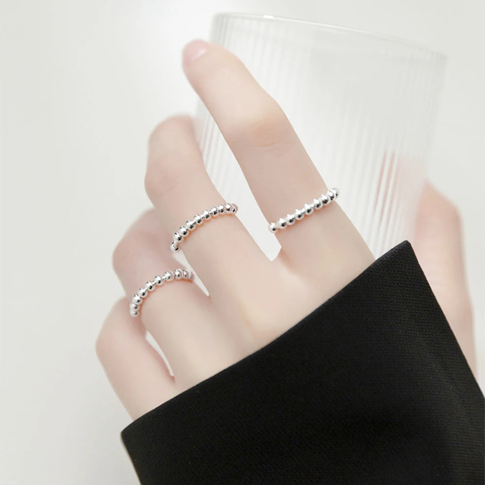 Anti-Stress-Ring mit drehbaren Perlen für Herren oder Damen Silber