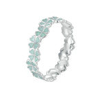 Ring mit grünen vierblättrigen Kleeblättern