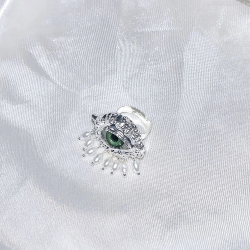 Schutzring mit blauem Auge und silbernen Perlen