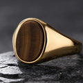 Vergoldeter Ring mit ovalem Tigerauge-Stein