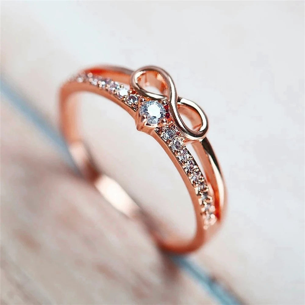 Doppelring mit Unendlichkeitssymbol aus Roségold