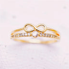 Doppelring mit Unendlichkeitssymbol aus Gold