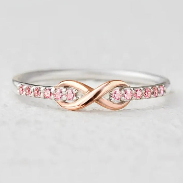 Anello infinito promessa eterna e cristalli scintillanti oro rosa e argento