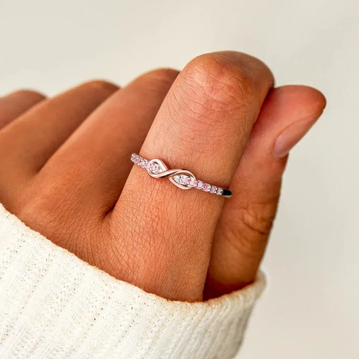 Anello infinito promessa eterna e cristalli scintillanti oro rosa e argento