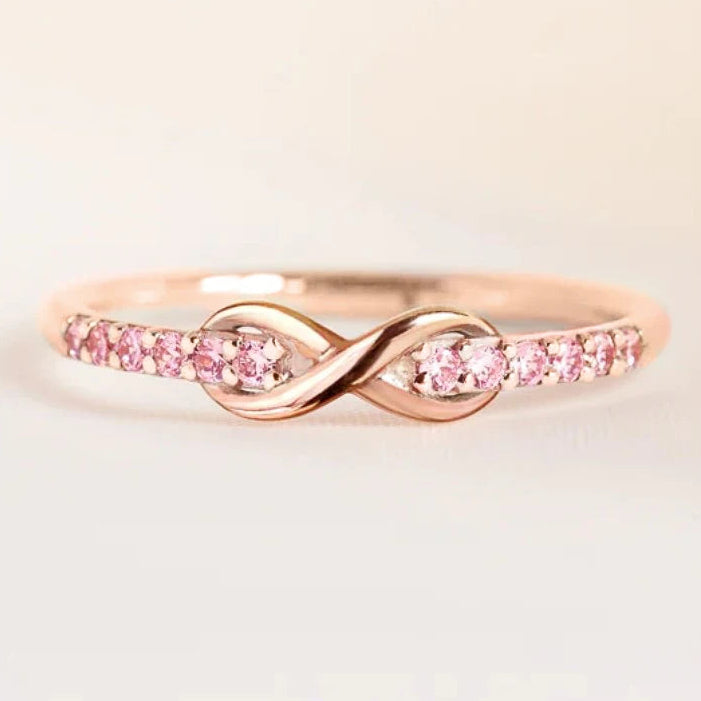 Anello infinito promessa eterna e cristalli scintillanti oro rosa