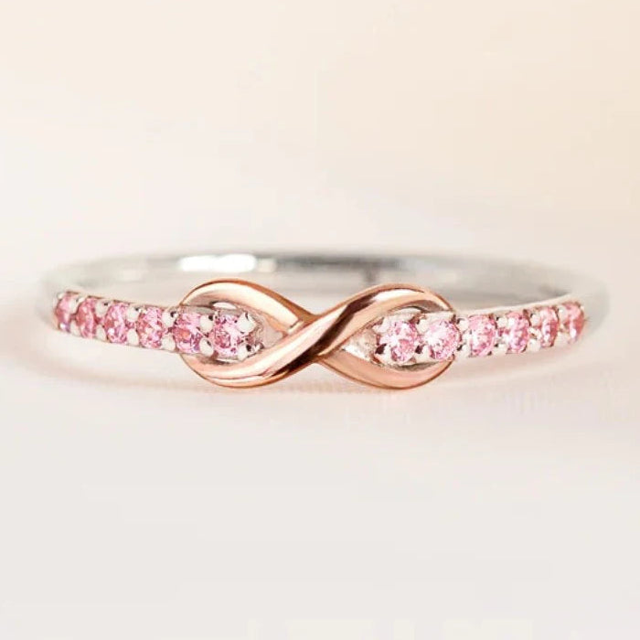Anello infinito promessa eterna e cristalli scintillanti oro rosa e argento