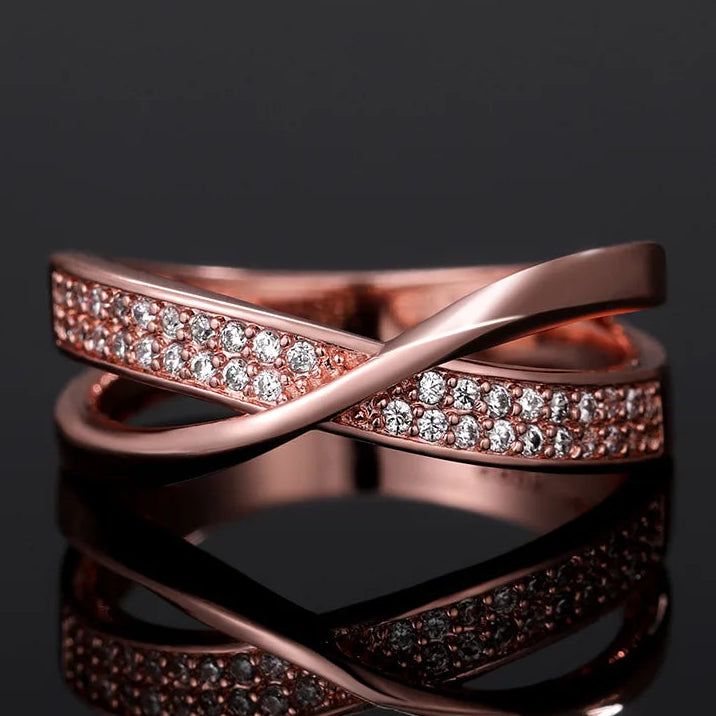 Anello infinito a nastri intrecciati oro rosa