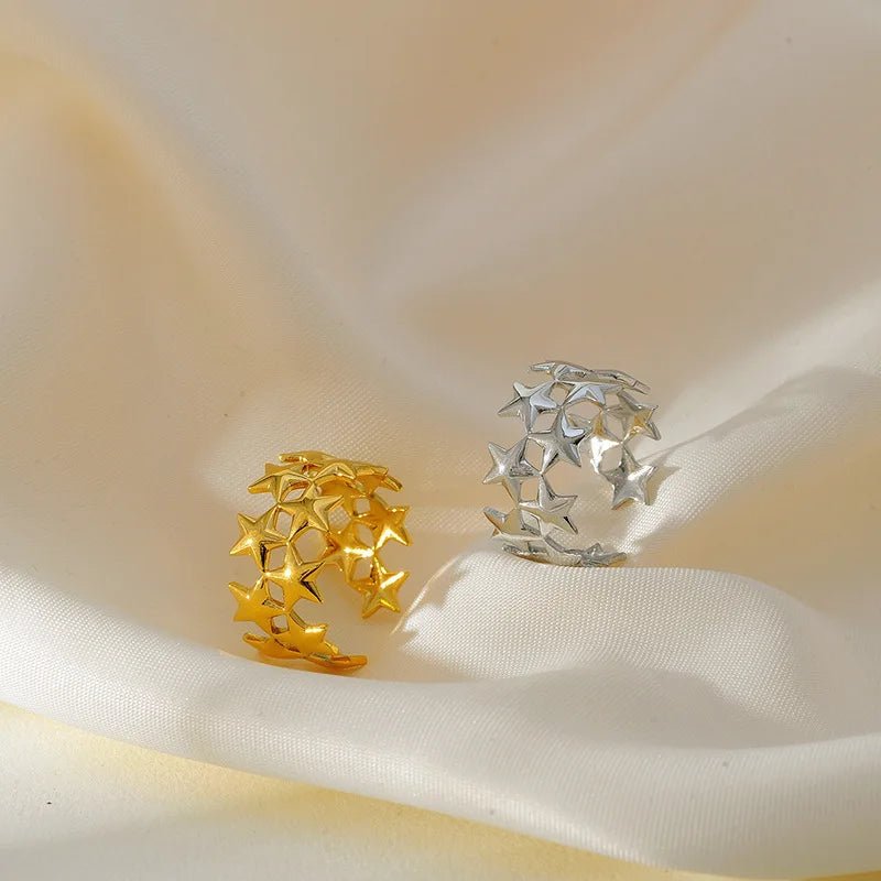 Breiter Ring mit mehreren Sternen aus Silber
