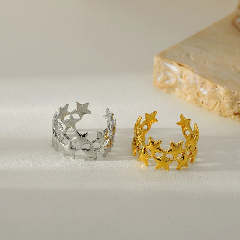 Breiter Ring mit mehreren Sternen aus Silber