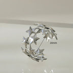 Breiter Ring mit mehreren Sternen aus Silber