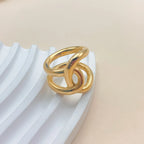 Origineller Ring mit Knoten, Gold
