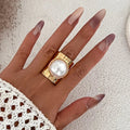 Retro Damenring mit goldener Perle