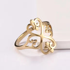 Durchbrochener Kleeblatt-Ring mit vier Herzen aus Gold