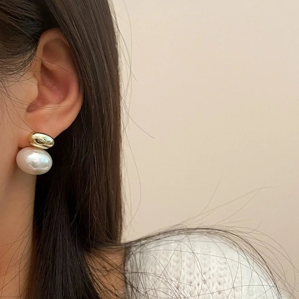Ohrringe mit doppelter Silberperle