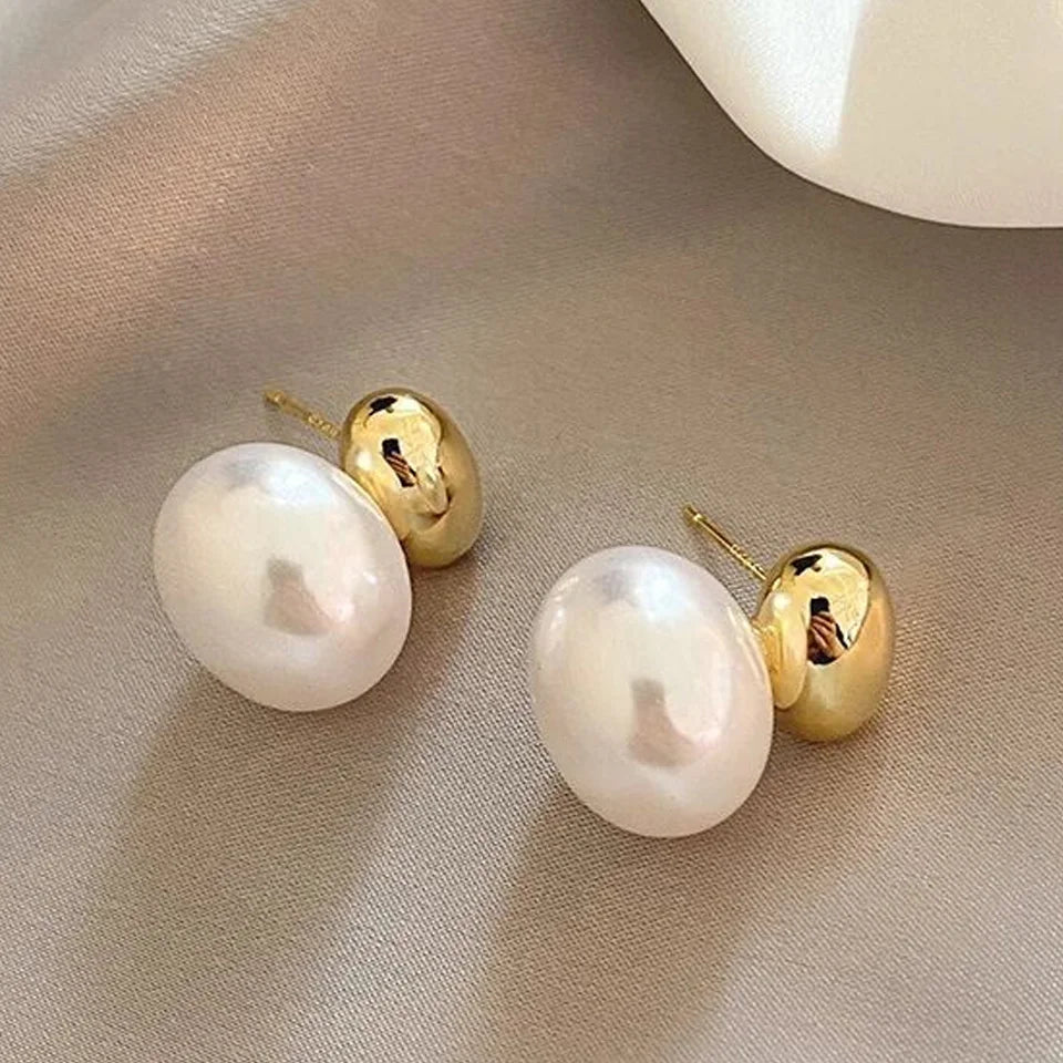 Ohrringe mit doppelter Goldperle