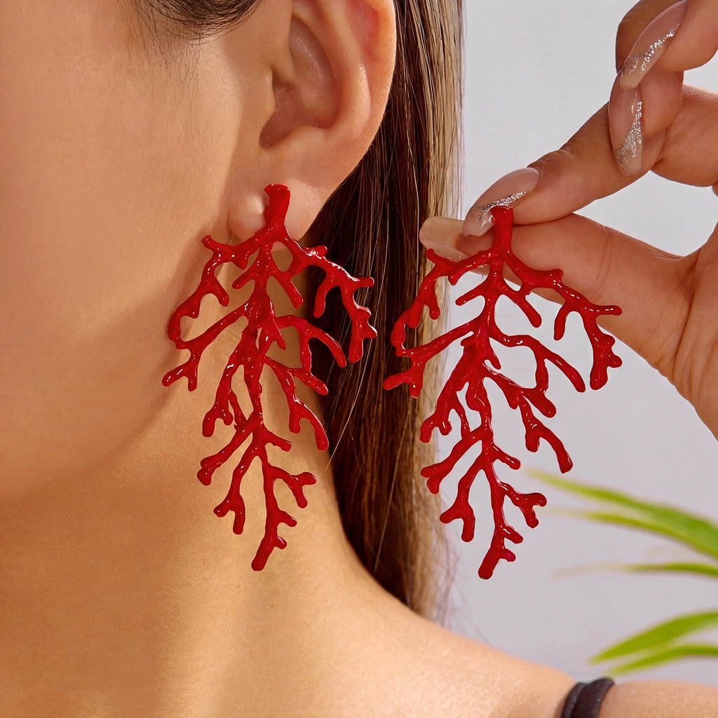 Ohrringe aus roter Korallenast