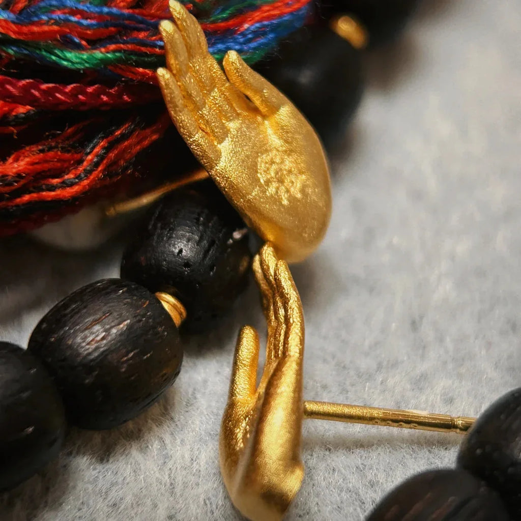 Ohrstecker Buddha-Hand Gold