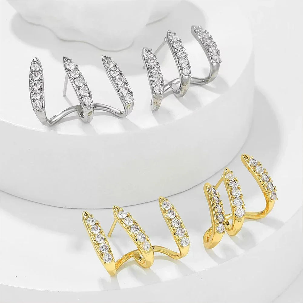 Boucles d'oreilles élégantes avec strass à trois griffes