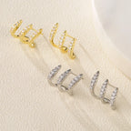 Boucles d'oreilles élégantes avec strass à trois griffes