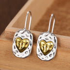 Boucles d'oreilles en cœur couleur argent et or