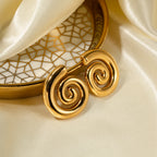 Ohrstecker in gewölbter Spiralform Gold