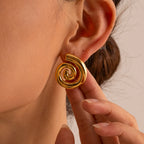 Ohrstecker in gewölbter Spiralform Gold