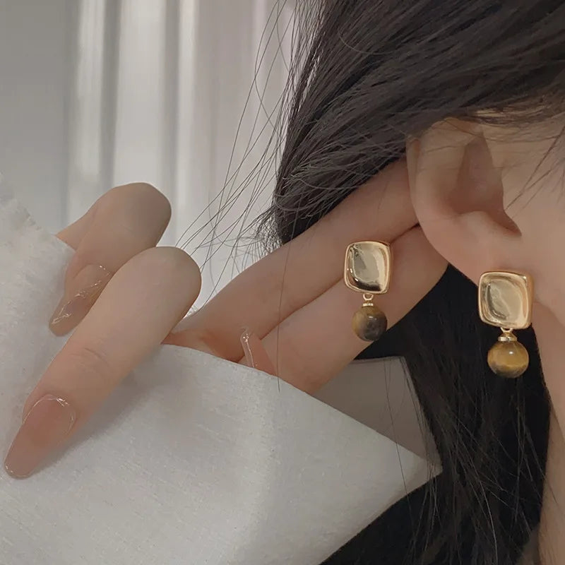 Damenohrringe mit Tigerauge-Stein