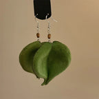 Hängende Ohrringe mit grünem farbigem Blatt