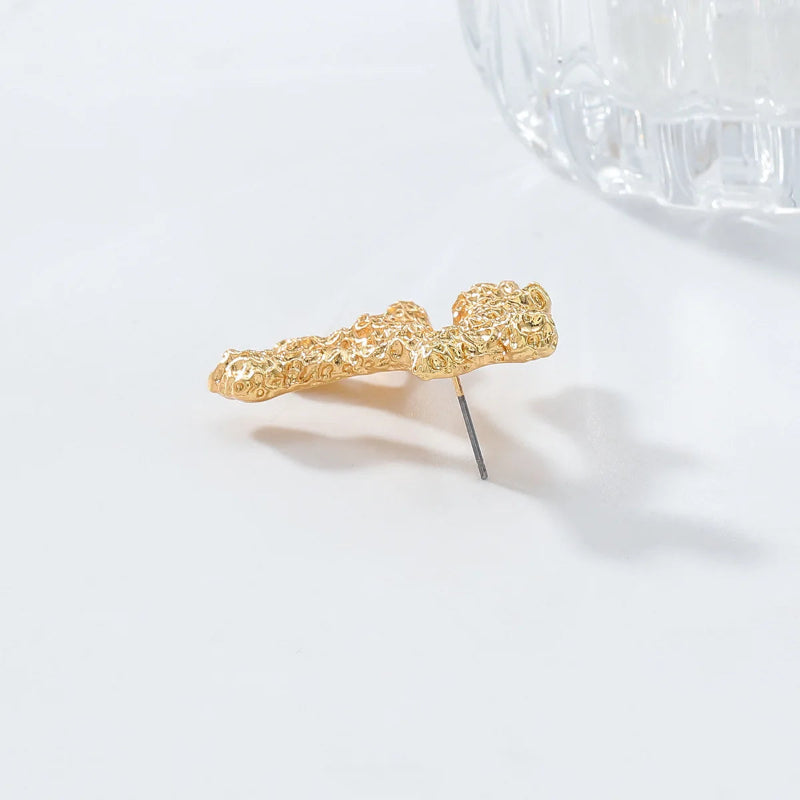 Hängende Korallenohrringe in Gold oder Silber