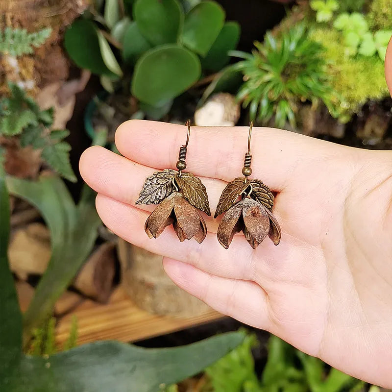 Hängende Ohrringe mit Herbstquaste