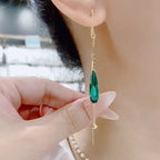 Hängende Ohrringe mit grünem Zirkon-Tropfen