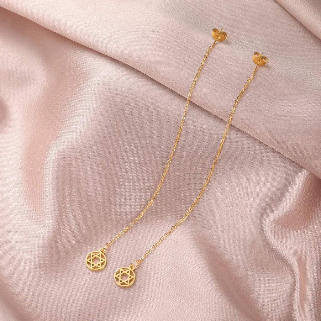 Lange hängende Ohrringe mit dem runden <span data-glossary-id="StarOfDavid">Davidstern</span> jüdisches Symbol Gold
