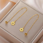 Lange hängende Ohrringe mit dem <span data-glossary-id="StarOfDavid">Davidstern</span> jüdisches Symbol Gold