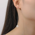 Lange hängende Ohrringe mit dem <span data-glossary-id="StarOfDavid">Davidstern</span> jüdisches Symbol Silber