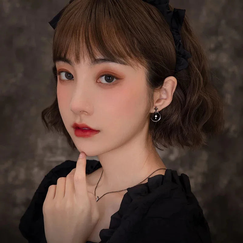 Hängende Ohrringe Mond und Sterne