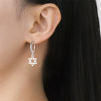Hängende Ohrringe für Damen mit dem symbolischen jüdischen Davidstern in Silber