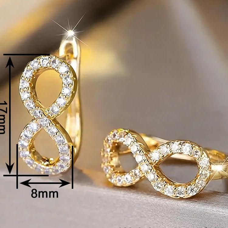 Orecchini pendenti con simbolo dell'infinito scintillante