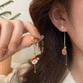 Ohrringe Weihnachtsmann und Geschenk
