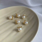 Perlenohrringe mit geometrischem Stab