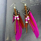 Federohrringe im Apachen-Stil fuchsia