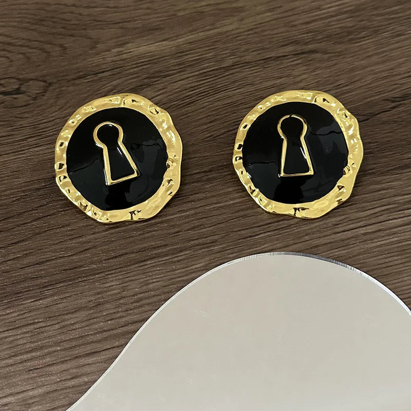 Runde Ohrringe Schlüssel schwarz