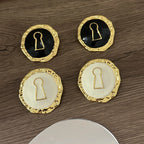 Runde Ohrringe Schlüssel 