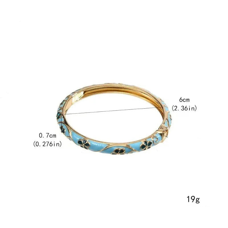 Armband mit Blumen- und Blättermotiven aus Farbemaille