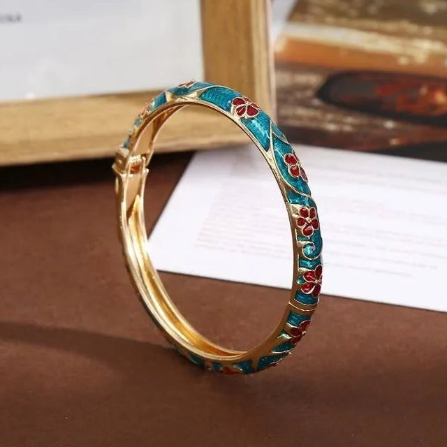 Armband mit Blumen- und Blättermotiven aus wassergrünem Farbemaille