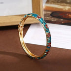 Armband mit Blumen- und Blättermotiven aus wassergrünem Farbemaille